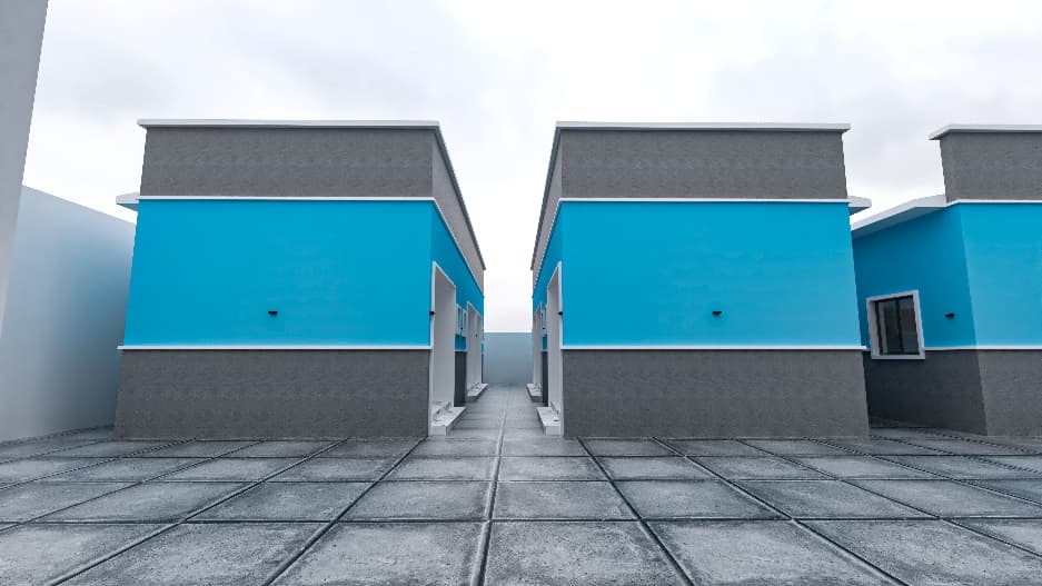 Turquoise and grey lodge block elevations around a paved courtyard